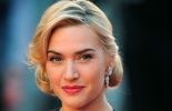 Kate Winslet décorée par Elisabeth II