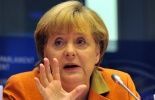 123 La chancelière allemande veut que les pays de la zone euro se surveillent