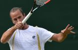 123 Malisse crée la sensation contre Simon